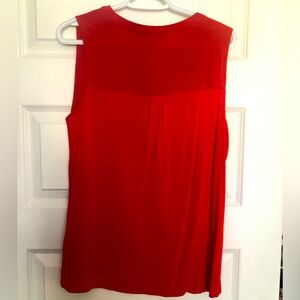 Red sleeveless top, size M